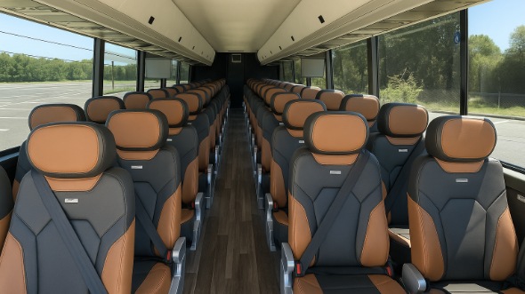 monroe 50 passenger charter bus rental