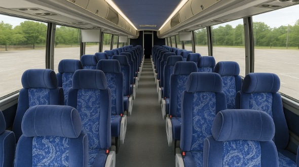 monroe 56 passenger charter bus rental
